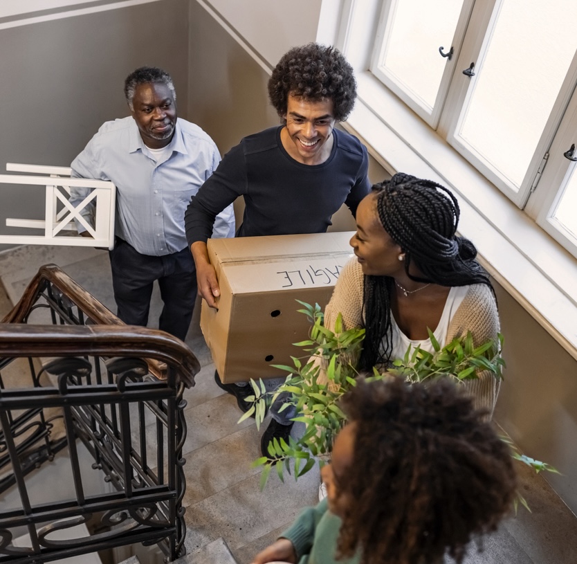 Close up of a African family moving home